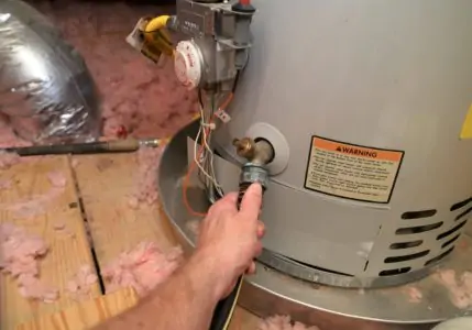 water heater with drain pan underneath