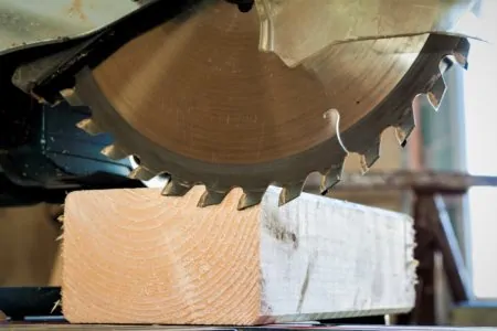 Cutting wood with a miter saw blade