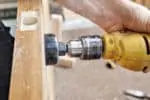 Drilling hole on a door with a hole saw