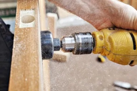 Drilling hole on a door with a hole saw