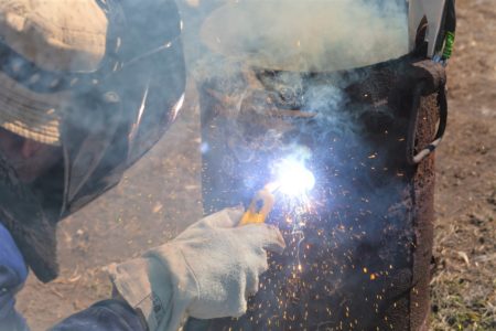 Man welding cast iron
