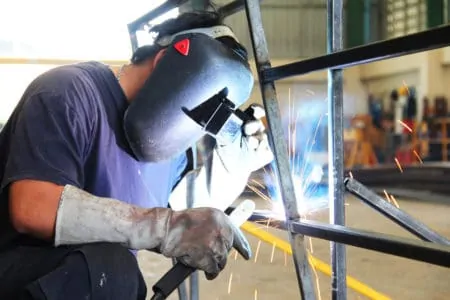 Man welding aluminum