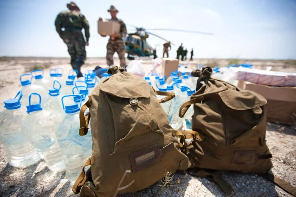 Army soldiers delivering bottle water
