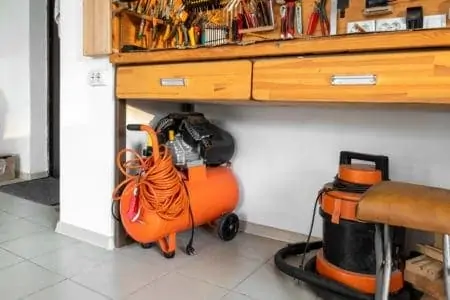 Orange small portable shop air compressor