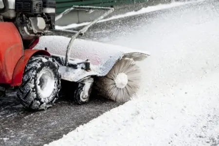 Removing light snow with electric snow blower