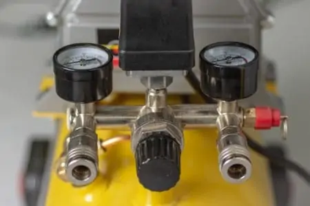 An air compressor pressure regulator