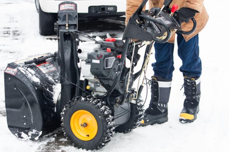 Woman with a new snow blower
