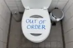Out Of Order Text On Toilet Bowl