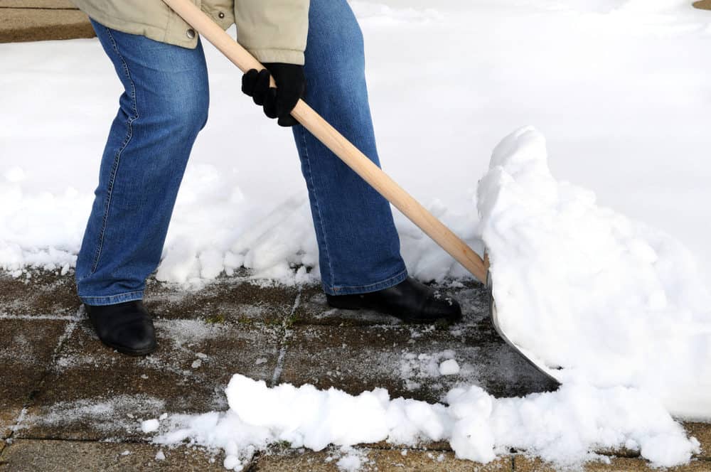 Snow shoveling position