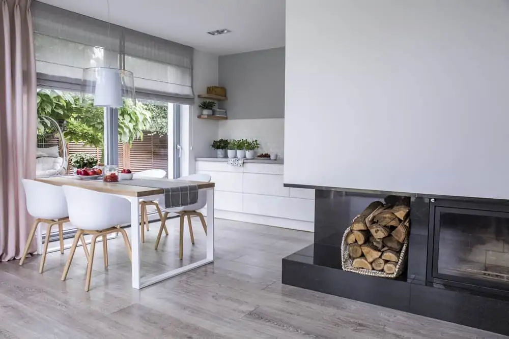 Modern kitchen with neutral shade curtains