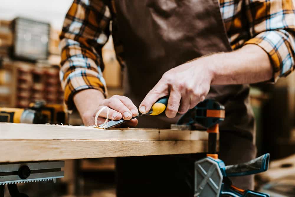 Carpenter working on a board