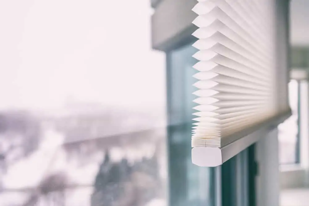 Home blinds - cordless cellular honeycomb pleated shade modern shades on apartment windows. Automated curtains blind.