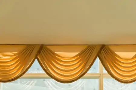 Golden curtains window luxury and classic style decoration interior of room with copy space for advertising text
