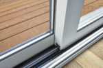 Sliding glass door detail and rail embed in floor