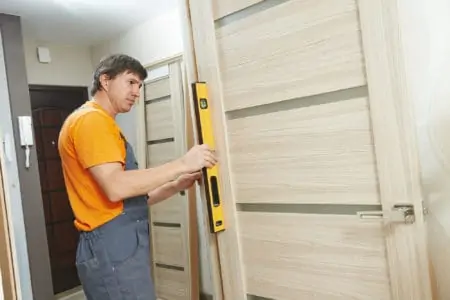 Carpenter works with level