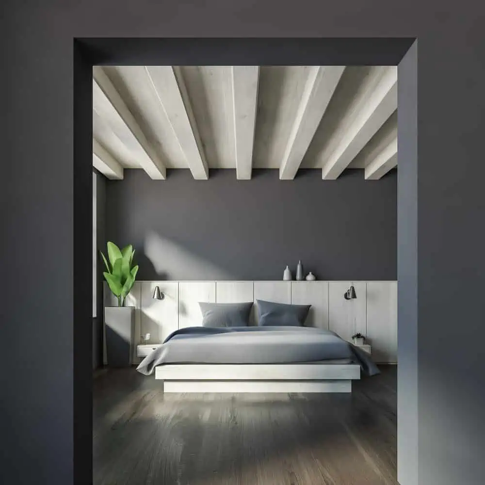 Interior of master bedroom with gray walls, dark wooden floor, big bed with two bedside tables and large archway. 3d rendering