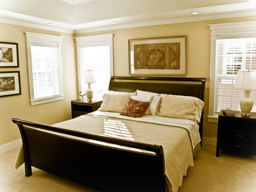 Very Nice bedroom with cream walls and bedding