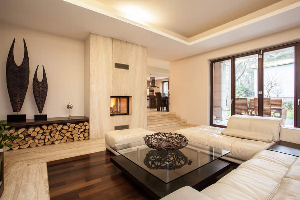 Travertine house: Interior of beige living room