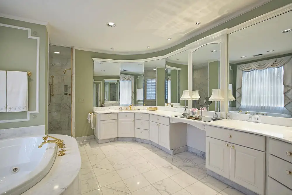 Master bath in luxury home with green walls