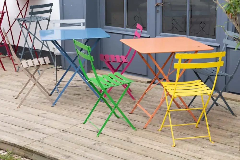 metal colorful chair seat in summer wood terrace