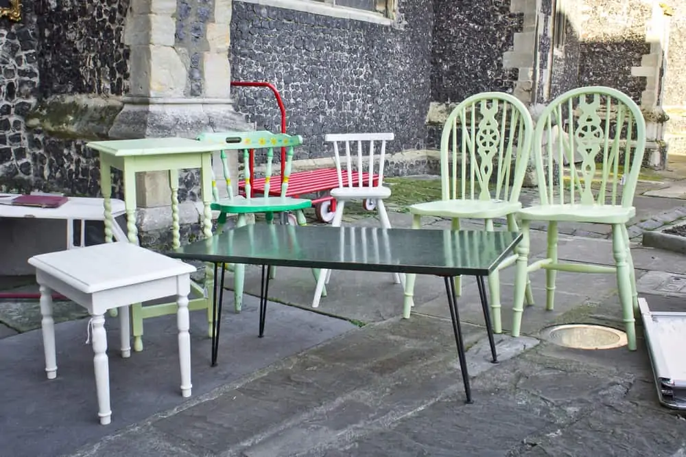 Second hand furniture for sale at a yard sale in the UK