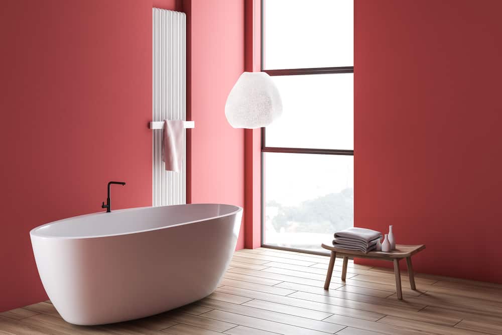 Pink bathroom corner with tub