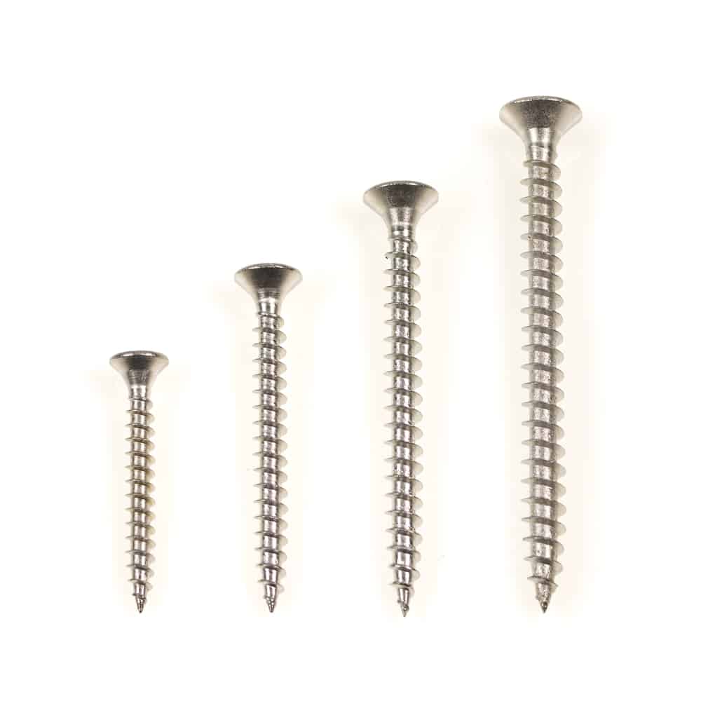 Different Sizes of Phillips screws in a row on a White Background