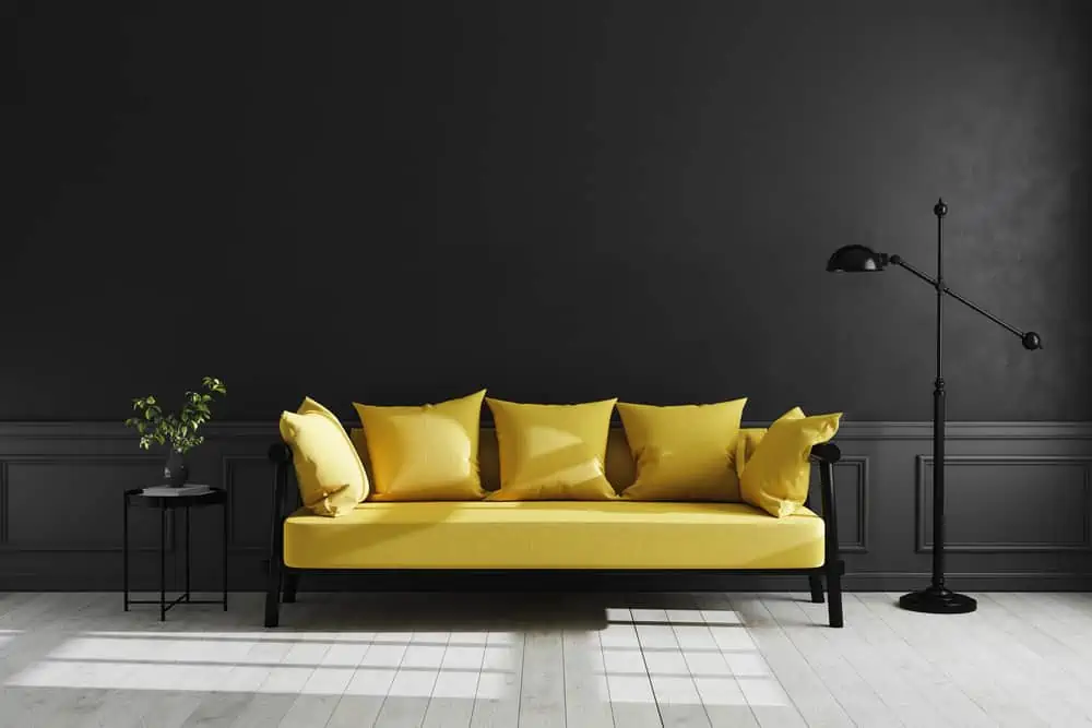 Luxury dark living room interior background, black empty wall mock up, modern living room with yellow sofa and black lamp and table, bright colors interior, scandinavian style, 3d rendering