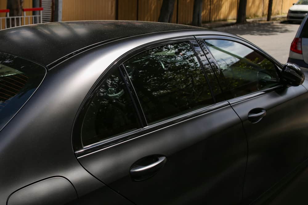 Car covered with black vinyl matte finish
